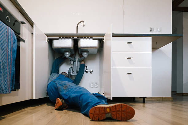 Professional Emergency Plumber technician working in Summerfield, MD